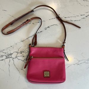Dooney & Bourke pink pebble grain letter carrier crossbody